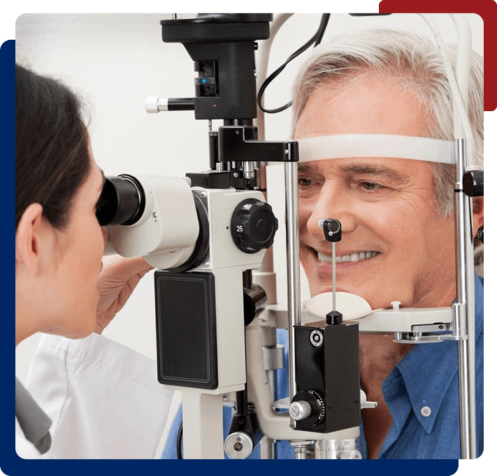 A man getting his eyes checked by an eye doctor.